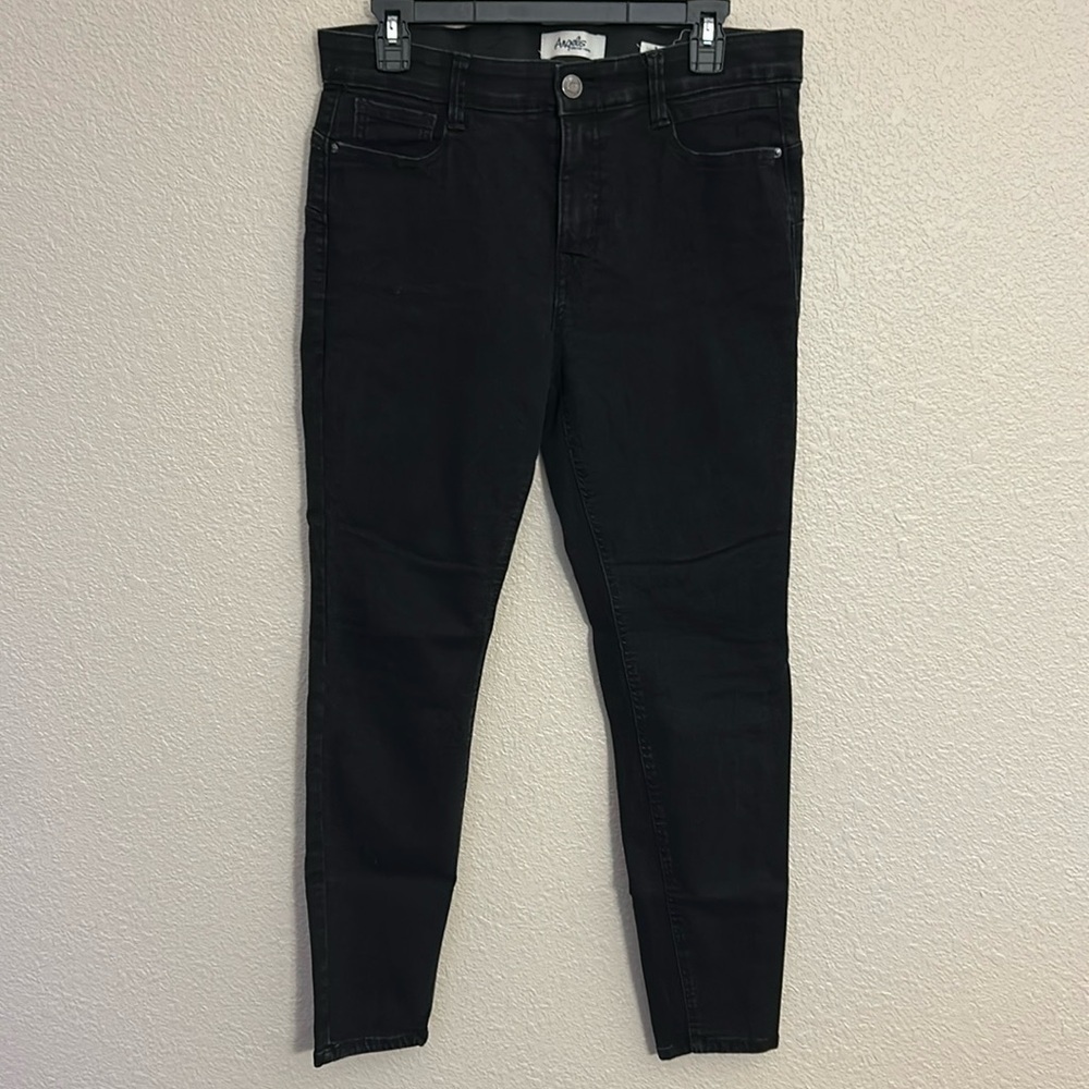Women’s black skinny jeans size 10.